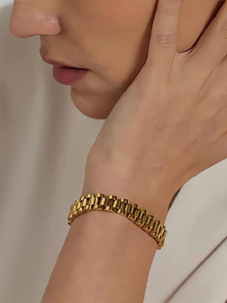Pulsera esclava tejido rlx, color oro, acero inoxidable